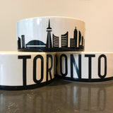 The Toronto bowl is a hand crafted ceramic with black foil displaying the toronto skyline