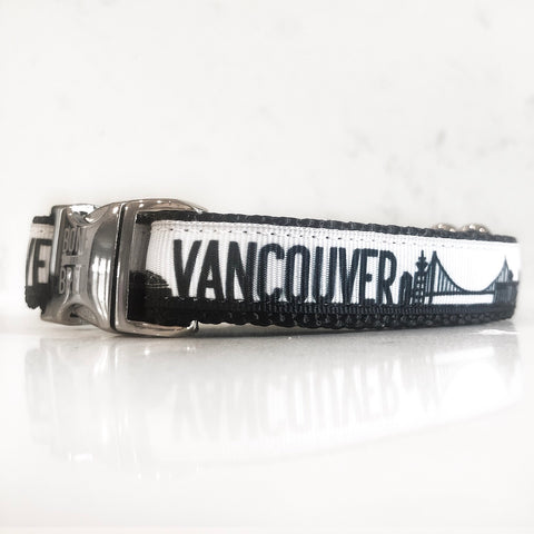 The vancouver dog collar from Bone and Bred seen here in black and white with a silver buckle.