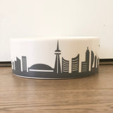 The Toronto bowl is a hand crafted ceramic with grey foil displaying the toronto skyline