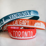 A pile of dog collars displaying the Vancouver collar, Calgary collar and Toronto collar from Bone and Bred